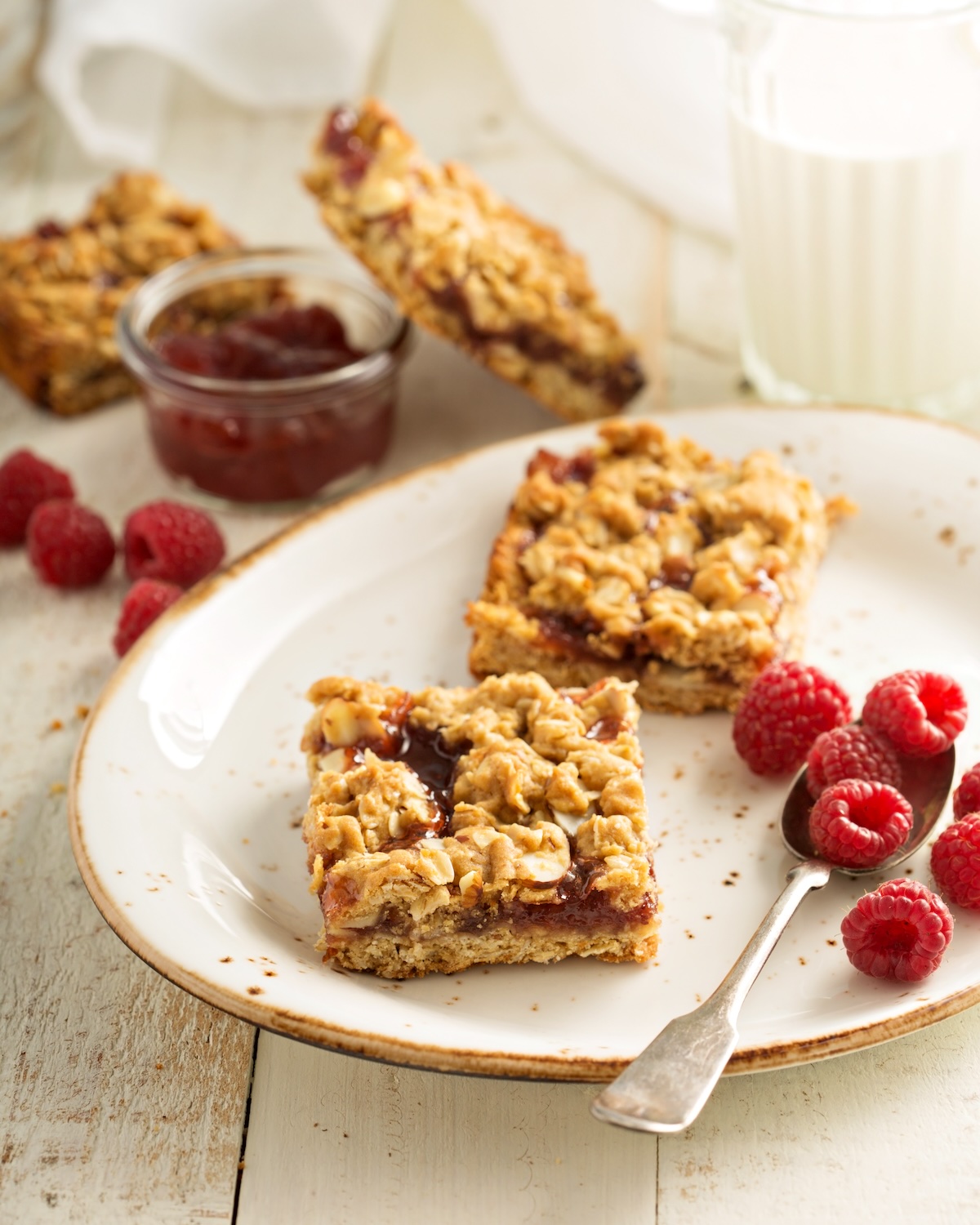 Almond oats and raspberry jam bars with crumble topping