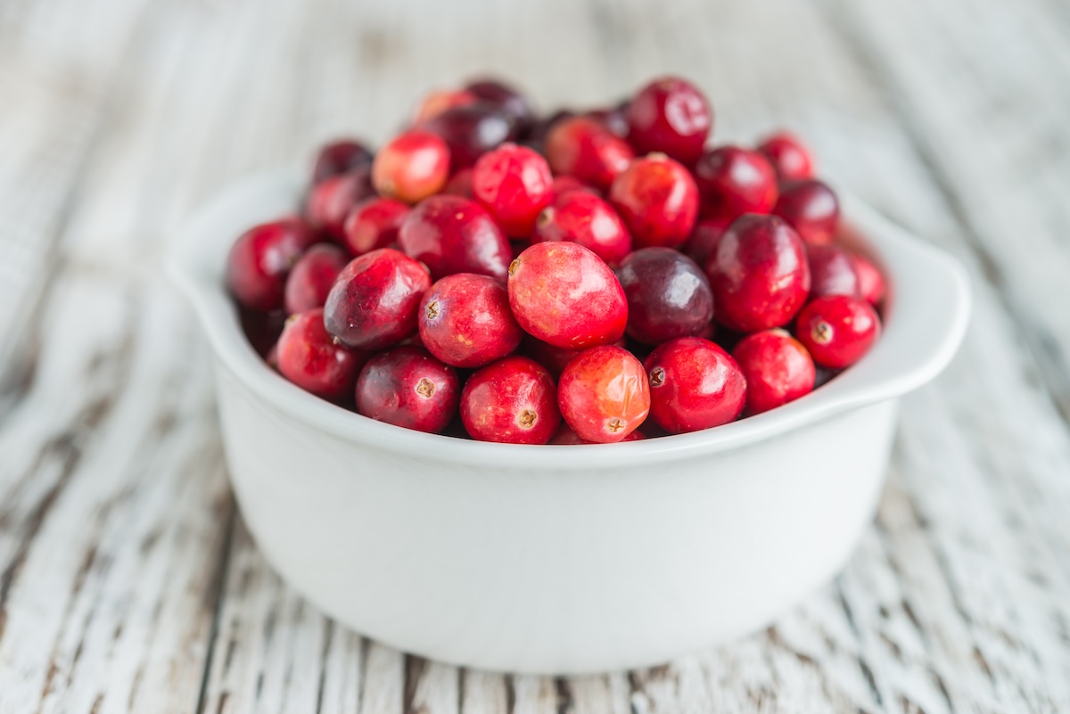 Cranberry on wooden background